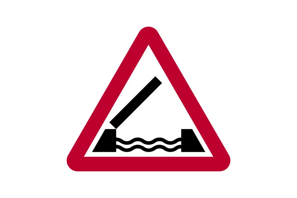 Opening or Swing Bridge Ahead vs Quayside or River Bank